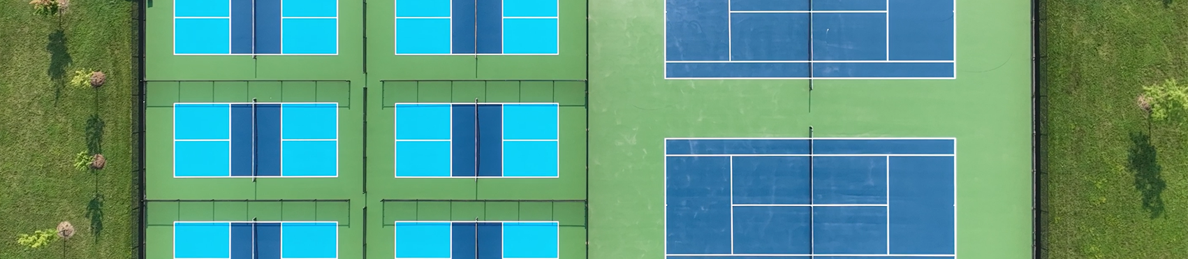 Overhead image of 6 pickleball courts and 2 tennis courts